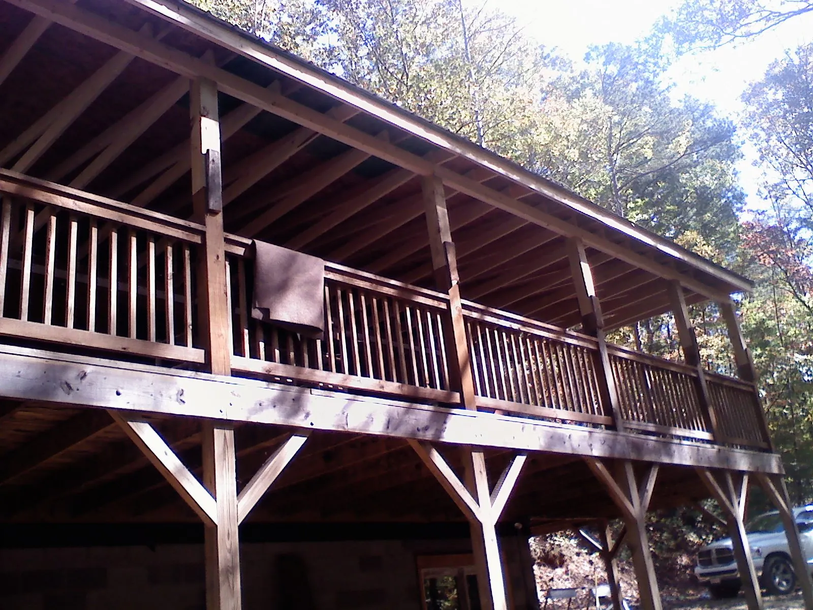 Timber framing under a new elevated porch and deck — Roof Leak Repair in Strawberry Point by Roofing Brothers